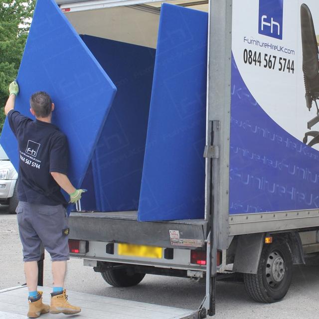 https://d1hcs5uofxldvl.cloudfront.net/furniture-hire-uk/article_additional/chapel1/chapel1.jpg - The unloading of furniture begins! Blue freestanding screens first...
