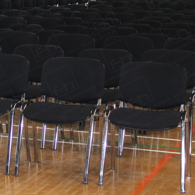 https://d1hcs5uofxldvl.cloudfront.net/furniture-hire-uk/article_additional/chapel7/chapel7.jpg - Black conference chairs laid out for chapel event.