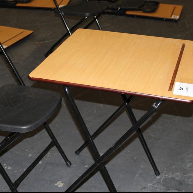 https://d1hcs5uofxldvl.cloudfront.net/furniture-hire-uk/article_additional/ucas-job6/ucas-job6.jpg - Tilted, smooth surface for student comfort.
