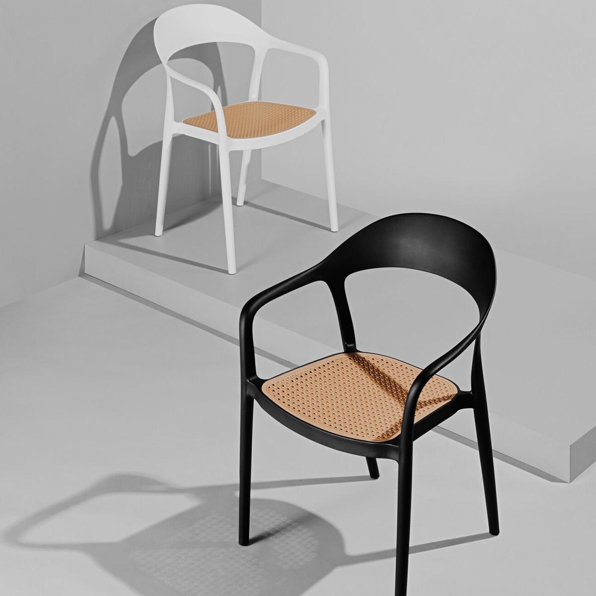 Featured: White and black Luna chairs with rattan seat.