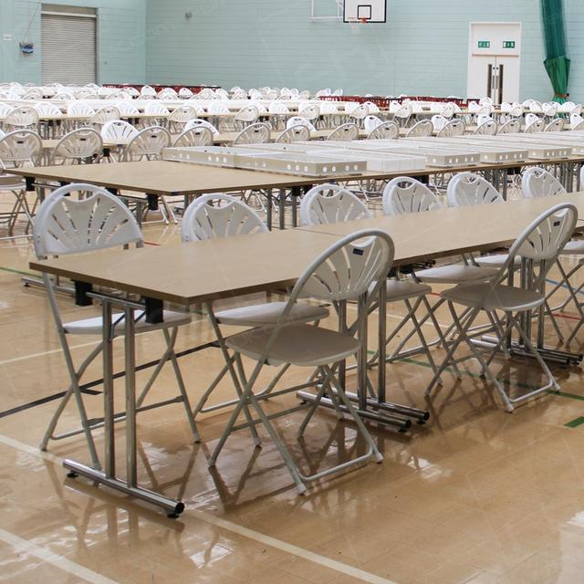 2015 Elections https://d1hcs5uofxldvl.cloudfront.net/furniture-hire-uk/article_additional/2015-elections8/2015-elections8.jpg - HC76, HM23 & HM24 - White folding fan back chair and modular tables for hire