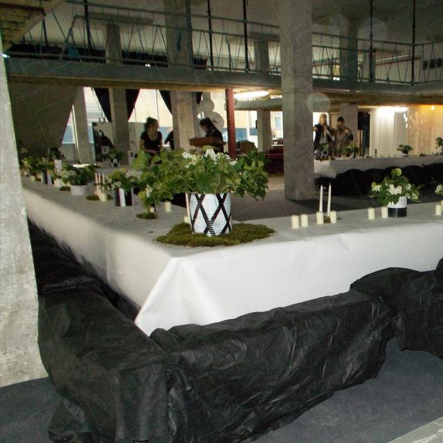 Art Launch with a Difference https://d1hcs5uofxldvl.cloudfront.net/furniture-hire-uk/article_additional/art-launch/art-launch.jpg - Trestle tables in London warehouse venue.