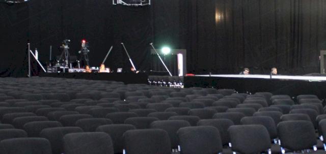 Catwalk Shows https://d1hcs5uofxldvl.cloudfront.net/furniture-hire-uk/article_additional/chair-hire-and-catwalk-shows6/chair-hire-and-catwalk-shows6-740x350.jpg - Black conference chairs make a subtle filming backdrop.