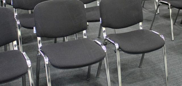 Conference & Meetings https://d1hcs5uofxldvl.cloudfront.net/furniture-hire-uk/article_additional/conference2/conference2-740x350.jpg - Stacking chairs positioned with comfortable gaps between seats.