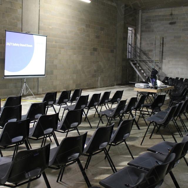 Construction Meeting https://d1hcs5uofxldvl.cloudfront.net/furniture-hire-uk/article_additional/construction-meeting3/construction-meeting3.jpg - Plastic seating set up for health & safety event.