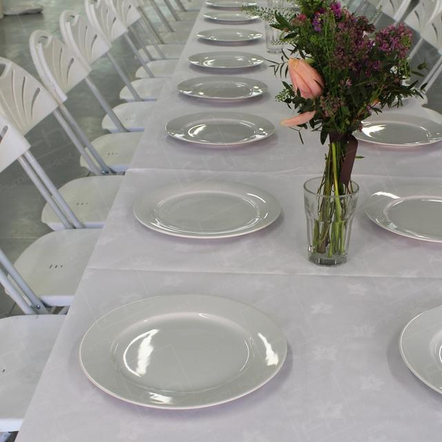 Corporate London Lunch https://d1hcs5uofxldvl.cloudfront.net/furniture-hire-uk/article_additional/corporate-lunch-london8/corporate-lunch-london8.jpg - White plates complement our white furniture.