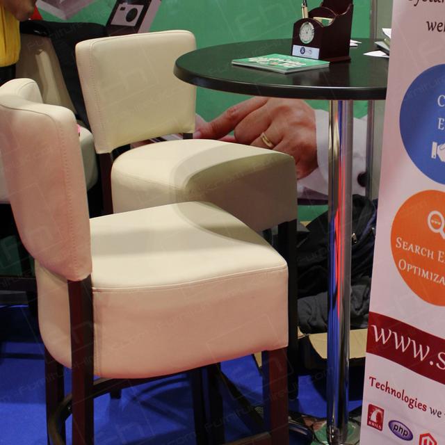 Walnut Furniture for Ultra-Classy Exhibitions https://d1hcs5uofxldvl.cloudfront.net/furniture-hire-uk/article_additional/executive-furniture-hire-at-exhibitions4/executive-furniture-hire-at-exhibitions4.jpg - Walnut poseur tables add an executive ambiance.
