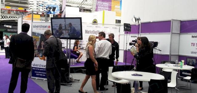 Exhibitions and Furniture Hire UK https://d1hcs5uofxldvl.cloudfront.net/furniture-hire-uk/article_additional/exhibitions1/exhibitions1-740x350.jpg - White tabling complements the modern exhibition backdrop.