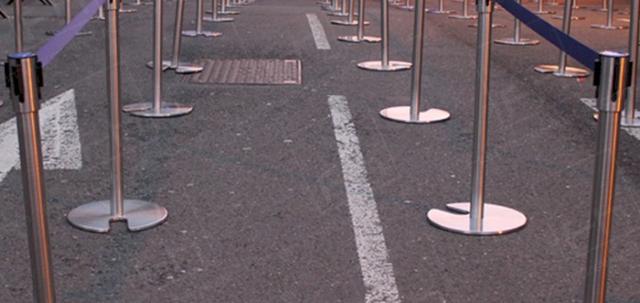 Football and Stretch Barrier Hire https://d1hcs5uofxldvl.cloudfront.net/furniture-hire-uk/article_additional/football-and-stretch-barrier-hire1/football-and-stretch-barrier-hire1-740x350.jpg - Our barriers installed outside event venue.