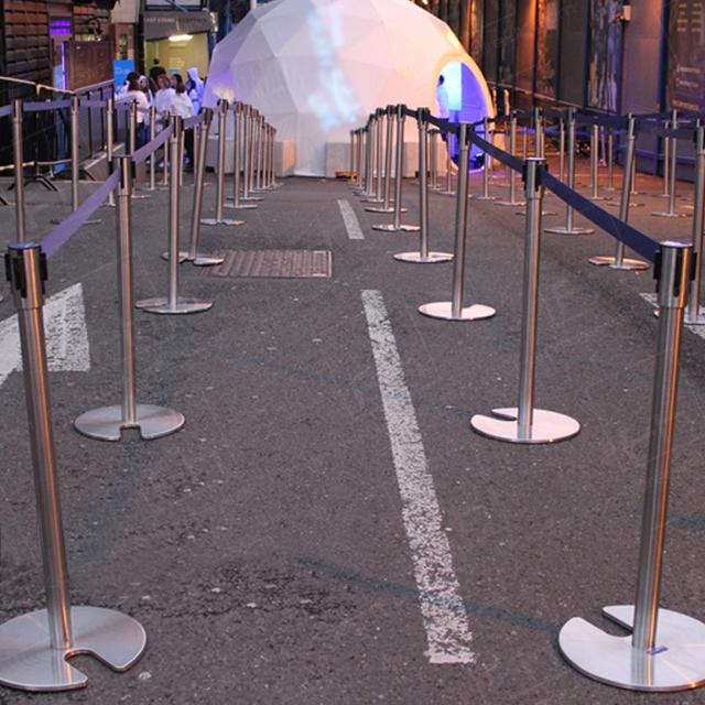 Football and Stretch Barrier Hire https://d1hcs5uofxldvl.cloudfront.net/furniture-hire-uk/article_additional/football-and-stretch-barrier-hire1/football-and-stretch-barrier-hire1.jpg - Our barriers installed outside event venue.