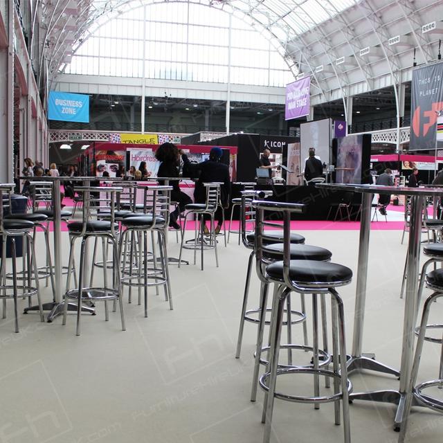 Hairdressing Exhibition https://d1hcs5uofxldvl.cloudfront.net/furniture-hire-uk/article_additional/hairdressing-exhibition13/hairdressing-exhibition13.jpg - Stools & tables for exhibition restaurant zone.