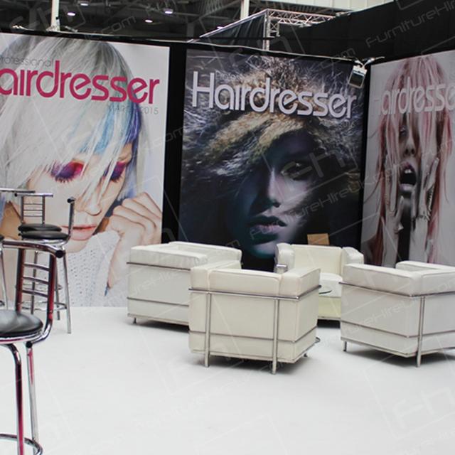 Hairdressing Exhibition https://d1hcs5uofxldvl.cloudfront.net/furniture-hire-uk/article_additional/hairdressing-exhibition7/hairdressing-exhibition7.jpg - Soft seating looks very welcoming!