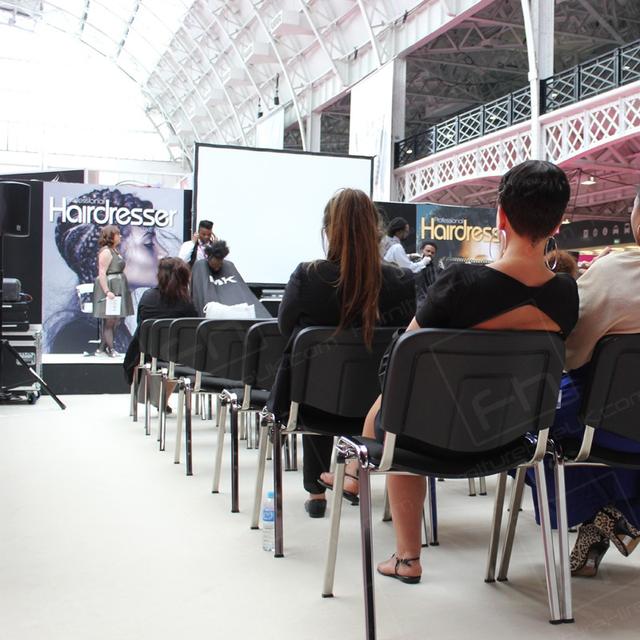 Hairdressing Exhibition https://d1hcs5uofxldvl.cloudfront.net/furniture-hire-uk/article_additional/hairdressing-exhibition8/hairdressing-exhibition8.jpg - Conference chairs give all delegates a comfy seat.