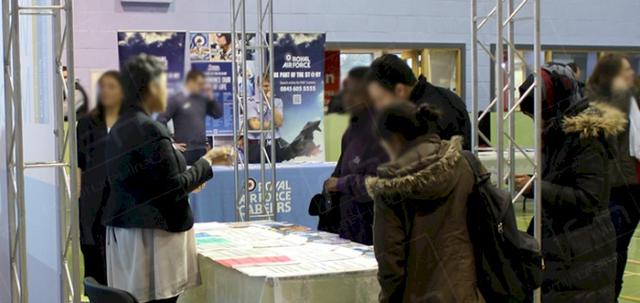 Host a Job Fair https://d1hcs5uofxldvl.cloudfront.net/furniture-hire-uk/article_additional/job-fair3/job-fair3-740x350.jpg - Tabling & linen making great surface for jobs' info.