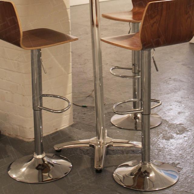 London Art Event https://d1hcs5uofxldvl.cloudfront.net/furniture-hire-uk/article_additional/london-art-event8/london-art-event8.jpg - Footrests boost stability of our walnut stools.