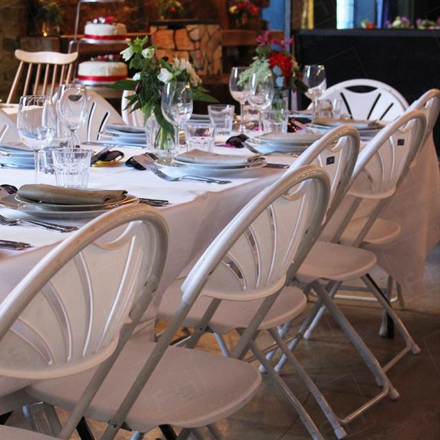 London Wedding https://d1hcs5uofxldvl.cloudfront.net/furniture-hire-uk/article_additional/london-wedding5/london-wedding5.jpg - Folding chairs lined up ready for guests.