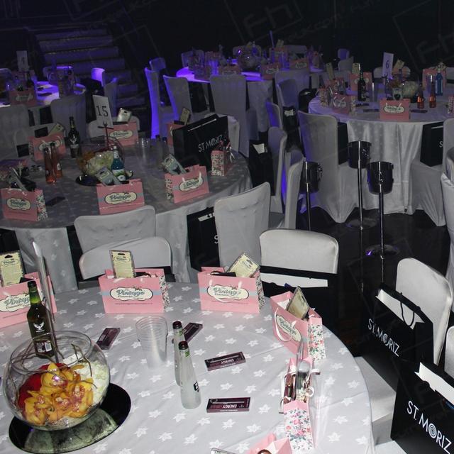 National Reality Television Awards 2013 https://d1hcs5uofxldvl.cloudfront.net/furniture-hire-uk/article_additional/national-reality-television-awards7/national-reality-television-awards7.jpg - Banquet tables and chairs complete with white chair covers.