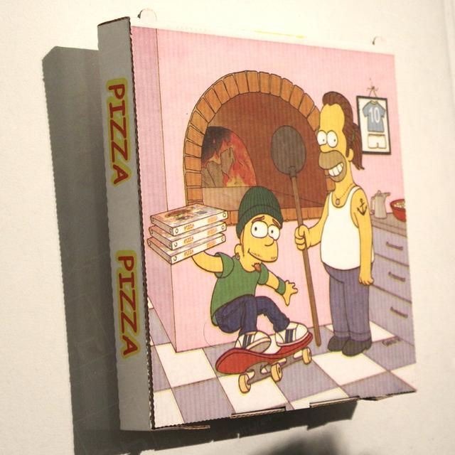 Pizza Exhibition https://d1hcs5uofxldvl.cloudfront.net/furniture-hire-uk/article_additional/pizza-exhibition6/pizza-exhibition6.jpg - Pizza box showing a famous animated family.