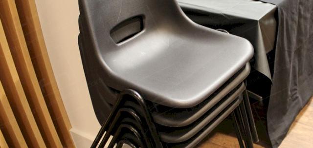 Budget Chairs Can Be Beautiful! https://d1hcs5uofxldvl.cloudfront.net/furniture-hire-uk/article_additional/plastic-chairs-at-film-night8/plastic-chairs-at-film-night8-740x350.jpg - Polyprop chairs stack ten high for storage.