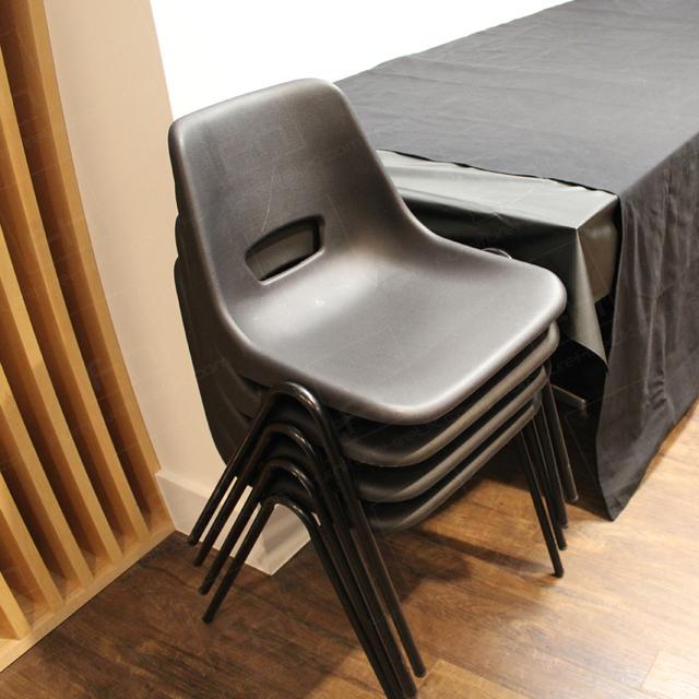 Budget Chairs Can Be Beautiful! https://d1hcs5uofxldvl.cloudfront.net/furniture-hire-uk/article_additional/plastic-chairs-at-film-night8/plastic-chairs-at-film-night8.jpg - Polyprop chairs stack ten high for storage.
