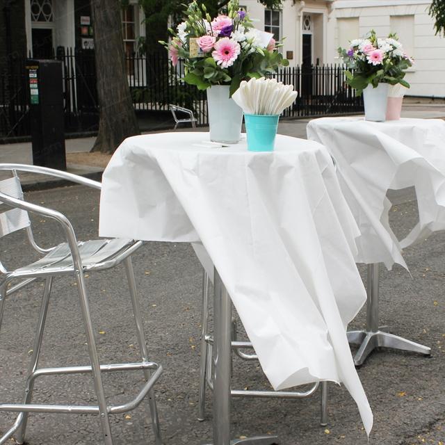 Street Party https://d1hcs5uofxldvl.cloudfront.net/furniture-hire-uk/article_additional/street-party10/street-party10.jpg - Poseur table cloths add a stylish look.