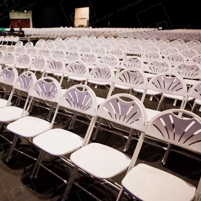 Westpoint 2013 https://d1hcs5uofxldvl.cloudfront.net/furniture-hire-uk/article_additional/westpoint12/westpoint12.jpg - Neat rows of thousands of chairs all ready for religious meeting.