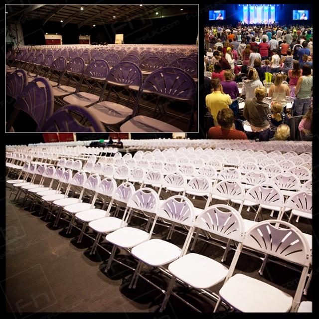 Westpoint 2013 https://d1hcs5uofxldvl.cloudfront.net/furniture-hire-uk/article_additional/westpoint14/westpoint14.jpg - White folding chairs lined up for religious meeting & talks.
