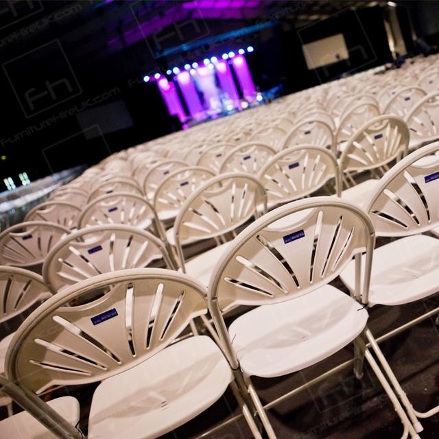 Westpoint 2013 https://d1hcs5uofxldvl.cloudfront.net/furniture-hire-uk/article_additional/westpoint8/westpoint8.jpg - White plastic seat & metal frame result in sturdy hire chairs.