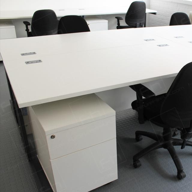 White is the New Black https://d1hcs5uofxldvl.cloudfront.net/furniture-hire-uk/article_additional/white-office-furniture8/white-office-furniture8.jpg - Cool contrasts created with black office chairs & white desks.