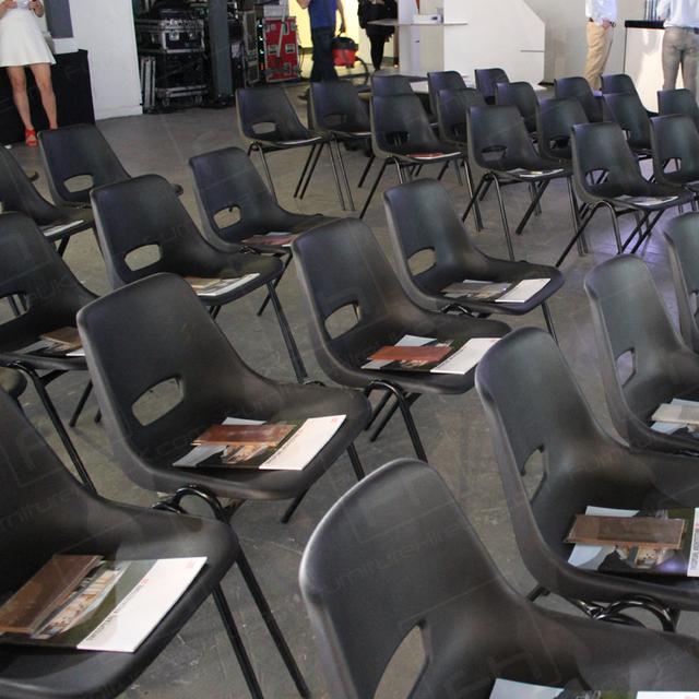 World Architecture Festival https://d1hcs5uofxldvl.cloudfront.net/furniture-hire-uk/article_additional/world-architecture-festival/world-architecture-festival.jpg - Black polyprop chairs and lightweight and cost effective. (HC98)
