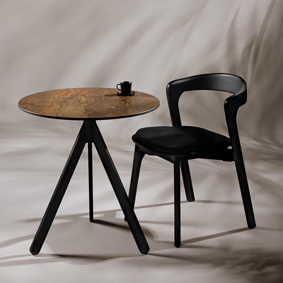 Featured: Black tray chairs with black pad.