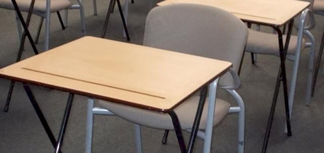 Assessments In The City https://mill-media.s3.eu-west-2.amazonaws.com/furniture-hire-uk/article_additional/assessments-in-the-city/assessments-in-the-city-740x350.jpg - Slightly tilted exam desk surface for comfort.