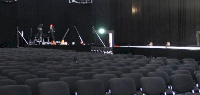 Catwalk Shows https://mill-media.s3.eu-west-2.amazonaws.com/furniture-hire-uk/article_additional/chair-hire-and-catwalk-shows6/chair-hire-and-catwalk-shows6-740x350.jpg - Black conference chairs make a subtle filming backdrop.