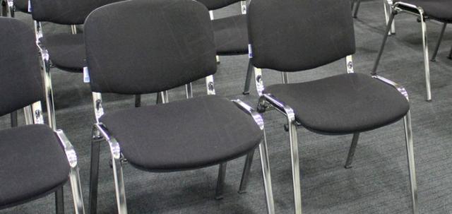 Conference & Meetings https://mill-media.s3.eu-west-2.amazonaws.com/furniture-hire-uk/article_additional/conference2/conference2-740x350.jpg - Stacking chairs positioned with comfortable gaps between seats.