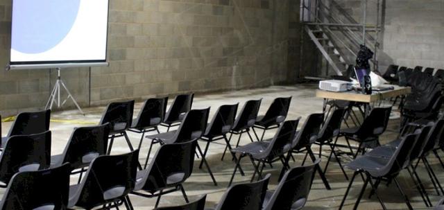 Construction Meeting https://mill-media.s3.eu-west-2.amazonaws.com/furniture-hire-uk/article_additional/construction-meeting3/construction-meeting3-740x350.jpg - Plastic seating set up for health & safety event.