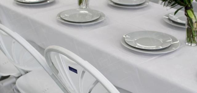 Corporate London Lunch https://mill-media.s3.eu-west-2.amazonaws.com/furniture-hire-uk/article_additional/corporate-lunch-london3/corporate-lunch-london3-740x350.jpg - Trestle tables dressed for fun workplace lunch.