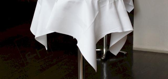 Foreign Exchange Event https://mill-media.s3.eu-west-2.amazonaws.com/furniture-hire-uk/article_additional/foreign-exchange-event-8/foreign-exchange-event-8-740x350.jpg - Oak poseur tables complemented by white linen and fresh flower centre pieces.