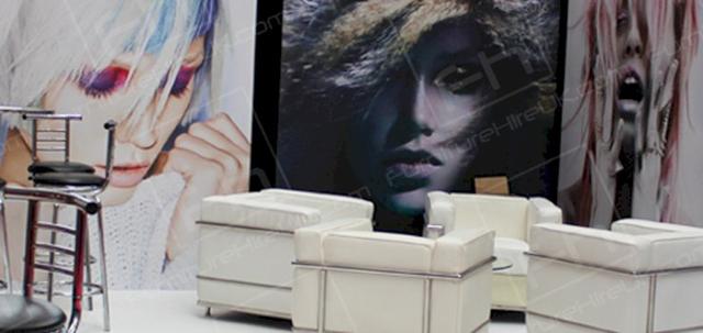 Hairdressing Exhibition https://mill-media.s3.eu-west-2.amazonaws.com/furniture-hire-uk/article_additional/hairdressing-exhibition7/hairdressing-exhibition7-740x350.jpg - Soft seating looks very welcoming!