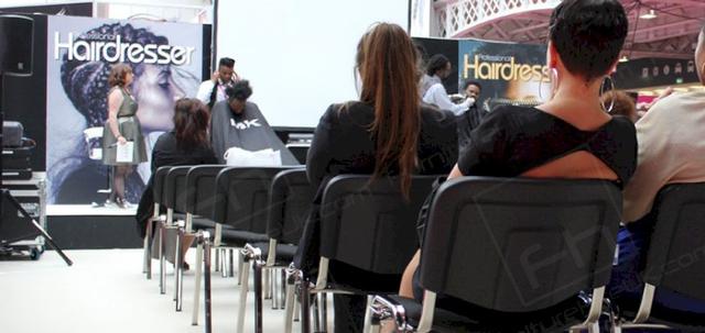 Hairdressing Exhibition https://mill-media.s3.eu-west-2.amazonaws.com/furniture-hire-uk/article_additional/hairdressing-exhibition8/hairdressing-exhibition8-740x350.jpg - Conference chairs give all delegates a comfy seat.