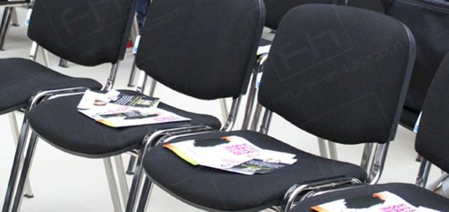 Hairdressing Exhibition https://mill-media.s3.eu-west-2.amazonaws.com/furniture-hire-uk/article_additional/hairdressing-exhibition9/hairdressing-exhibition9-740x350.jpg - Black conference chairs installed for ProHairLive seminars.