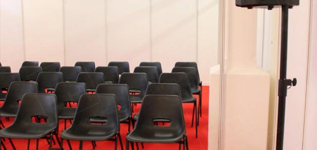 Large Conferences & Meetings https://mill-media.s3.eu-west-2.amazonaws.com/furniture-hire-uk/article_additional/large-conference-7/large-conference-7-740x350.jpg - Furniture prepared and ready for the event to start.