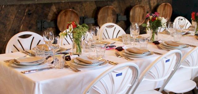 London Wedding https://mill-media.s3.eu-west-2.amazonaws.com/furniture-hire-uk/article_additional/london-wedding13/london-wedding13-740x350.jpg - Elegant white folding chairs for city wedding.