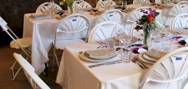 London Wedding https://mill-media.s3.eu-west-2.amazonaws.com/furniture-hire-uk/article_additional/london-wedding3/london-wedding3-740x350.jpg - Long tables can seat many guests.