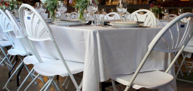 London Wedding https://mill-media.s3.eu-west-2.amazonaws.com/furniture-hire-uk/article_additional/london-wedding7/london-wedding7-740x350.jpg - Long tables making the most of the room available.