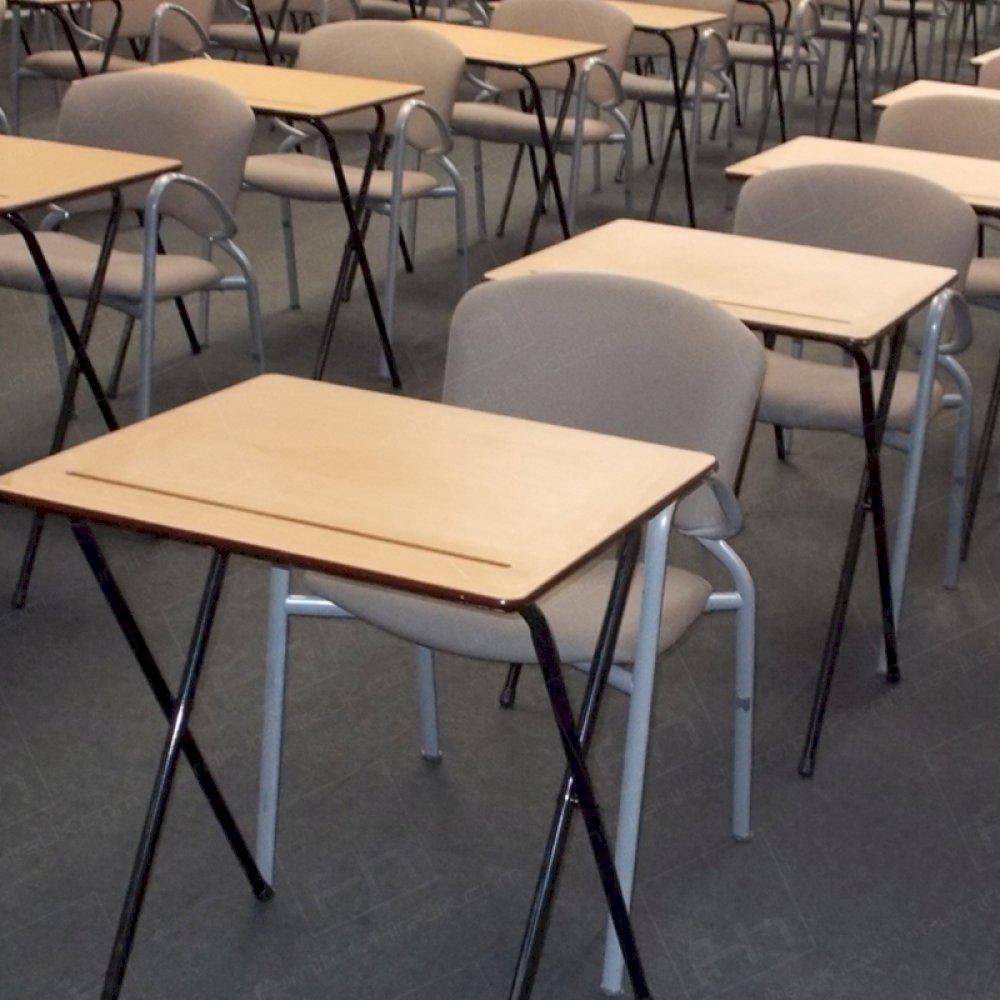 Slightly tilted exam desk surface for comfort.