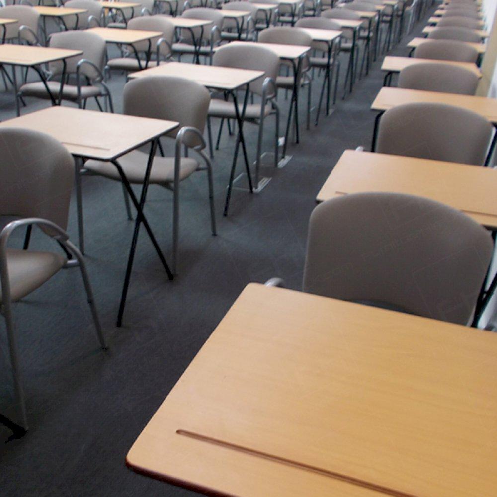 Folding exam desks set up in London venue.