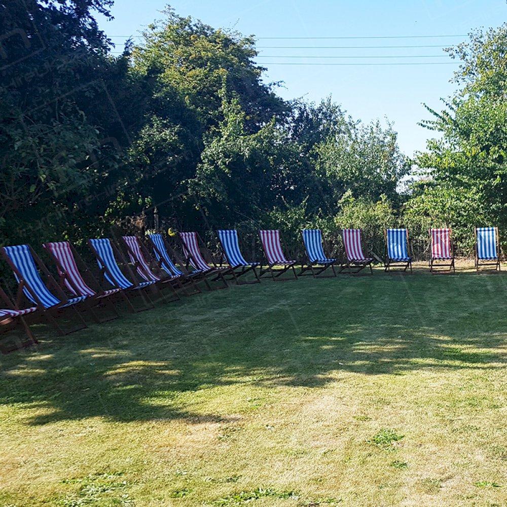 Our deck chairs can be hired in either blue or red and are a must-have for any outdoor event.