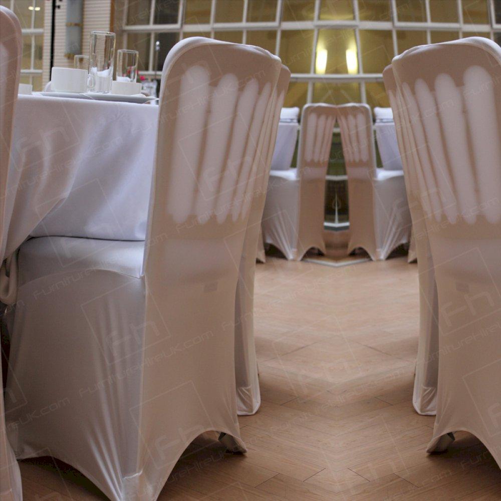 White chair covers & linen for a deluxe look.