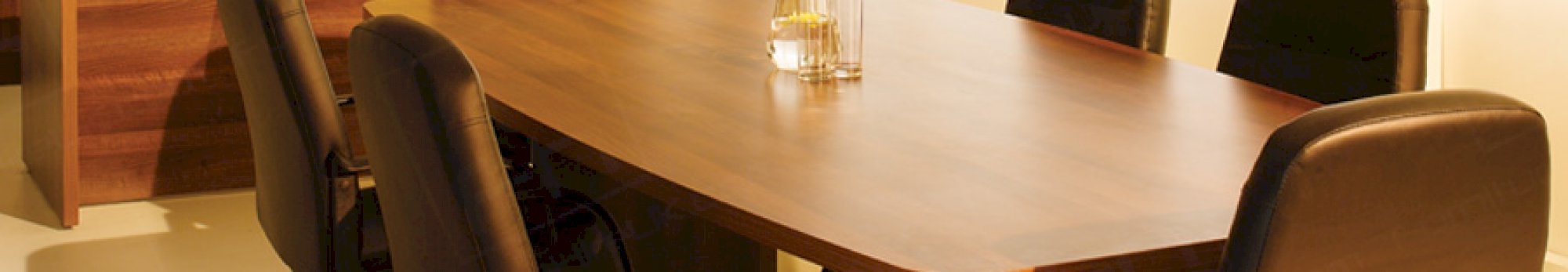 walnut boardroom with cantilever chairs