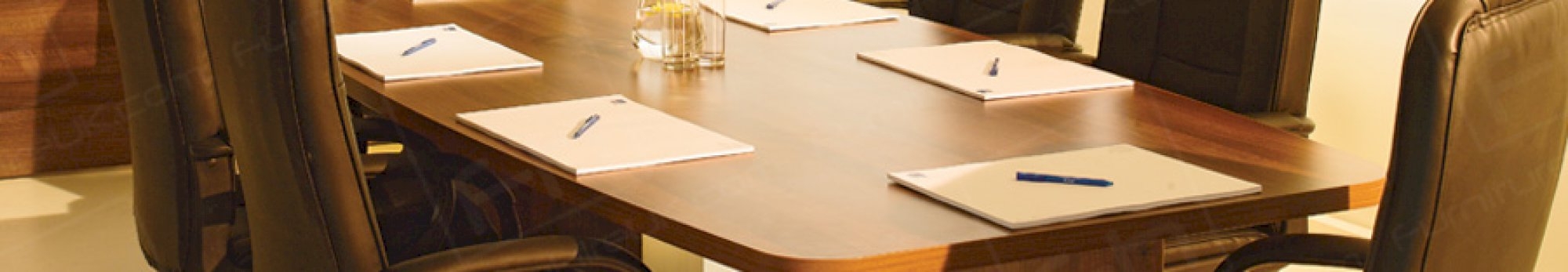 executive boardroom table with managers chairs
